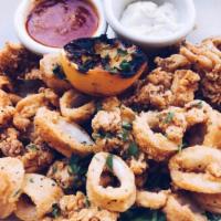 Calamari · Dusted with seasoned flour and flash fried. Served with roasted garlic aioli and marinara fo...