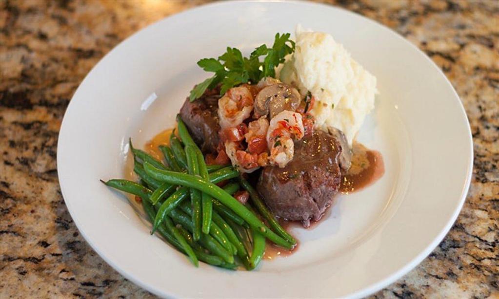 Marmalade Steak and Lobster · New York strip, Maine lobster saute, jumbo asparagus, Yukon gold mashed potatoes and bearnaise.