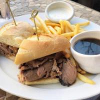 8 oz. Prime Rib French Dip · Thinly sliced roast prime rib warmed in rich beef jus and piled high in a crusty French roll...