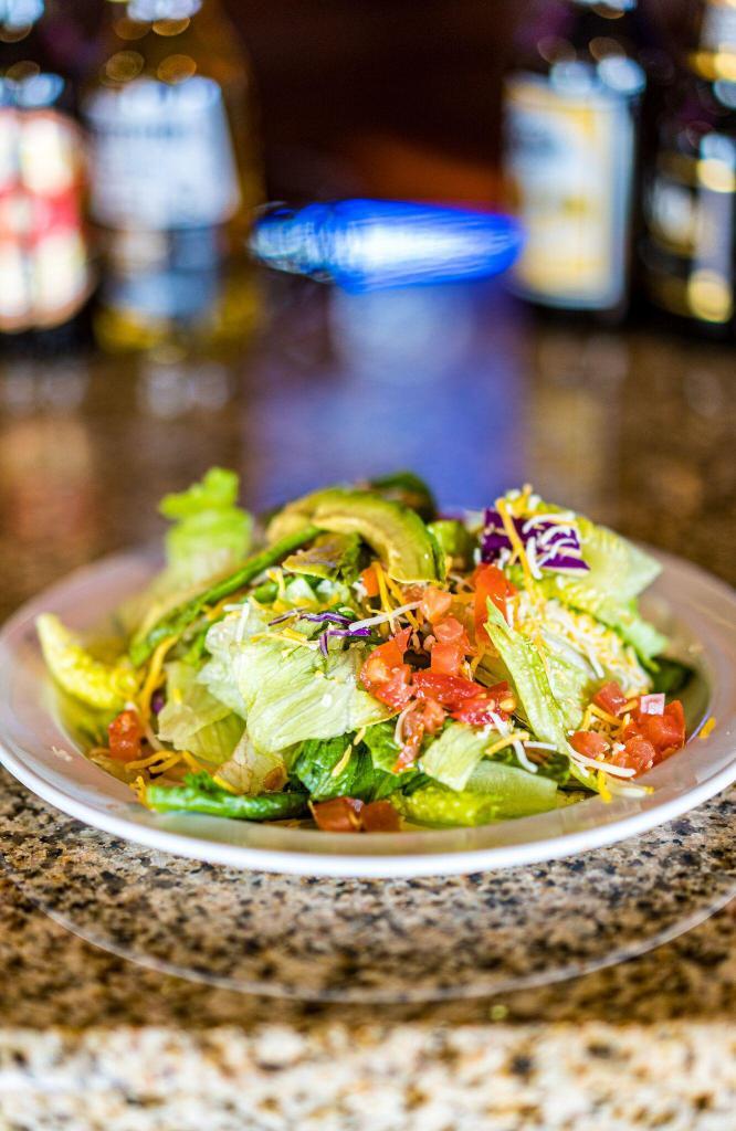 House Salad · Include mixed greens, cabbage, carrots, cucumber, cheese, tomatoes and avocado.