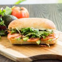 3. The Mills Turkey Sandwich · Thin-sliced smoked turkey breast, Gouda cheese, tomatoes, red onions, mixed greens and honey...