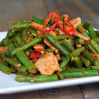 EN4. Pad Prick Khing · Stir-fried with green bean, lime leaves, red curry paste, and Thai seasoning. Spicy.