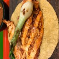 Chicken Taco · Handmade tortilla, grilled onions and salsa verde.