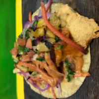 Fish Taco · Lightly battered fish, Mexican coleslaw, pico de gallo and chipotle dressing.