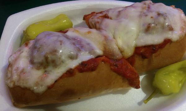 Classic Meatball and Cheese · Delicious homemade meatballs covered with our meat sauce and cheese. Served on a 8'' French roll. Pepperoncinis served on the side.