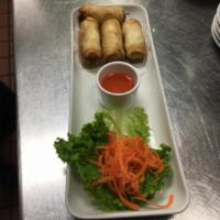 5. Spring Roll · 4 pieces. Cabbage, bean thread, carrot and mushroom served with sweet and sour sauce.