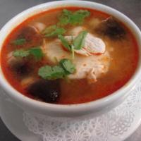 19. Tom Yum Soup · Spicy and sour soup with mushroom and lemon grass seasoning. Hot and spicy.