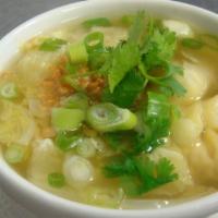 21. Wonton Soup · Pork and shrimp in wonton skin, napa cabbage and spring onion in chicken broth.