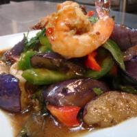 67. Goong Pad Eggplant Basil · Stir fried jumbo shrimps with eggplant in garlic and black bean sauce and tossed with fresh ...