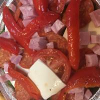 Antipasti Salad · Lettuce, Tomatoes, Cucumbers, Peppers, Ham, Pepperoni, and fresh Mozzarella Cheese