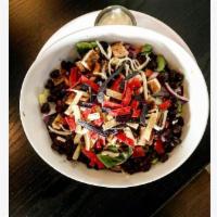 BBQ Chicken Salad · Romaine lettuce, tomatoes, black beans, red onions, Monterey cheese, BBQ sauce, corn and tor...