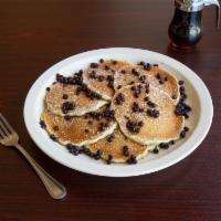 Blueberry Pancakes · 6 buttermilk pancakes filled with fresh blueberries. Dusted with powdered sugar. Served with...
