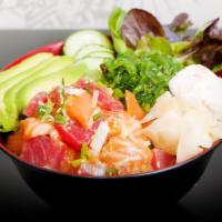 Citrus Shoyu Poke Bowls · Citrus shoyu, tuna, salmon, crabmeat, seaweed salad and vegetables over spring mix, house dr...