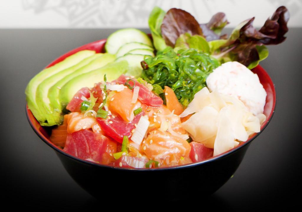 Citrus Shoyu Poke Bowls · Citrus shoyu, tuna, salmon, crabmeat, seaweed salad and vegetables over spring mix, house dressing and rice with house ponzu sauce and sesame oil.