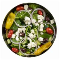 It's Greek to Me Salad · Hearts of romaine, baby spinach, shaved red onions, Kalamata olives, feta cheese, cherry tom...