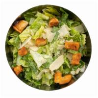 Caesar Salad · Hearts of romaine, shaved Parmesan cheese and croutons, tossed with classic Caesar dressing.