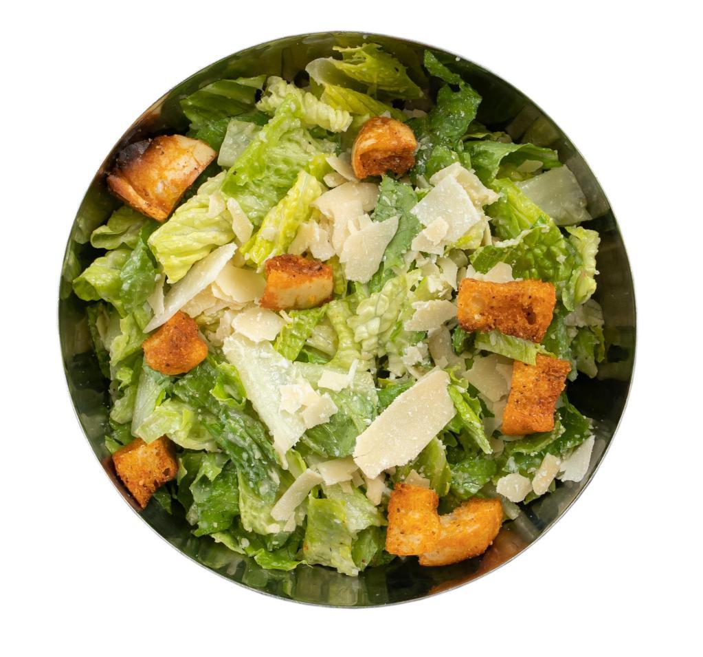 Caesar Salad · Hearts of romaine, shaved Parmesan cheese and croutons, tossed with classic Caesar dressing.