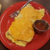 Omelette · Choice of up to 3 ingredients folded into a 3-egg omelet, topped with choice of cheese.