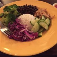 Grilled Chicken Bowl · Grilled chicken, broccoli, cucumber, red cabbage, and black beans served around a cup of our...