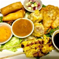 Appetizers Platter · Combination of 2 steamed dumpling, 2 spring rolls, 2 curry puffs, 2 chicken satay and 2 Thai...