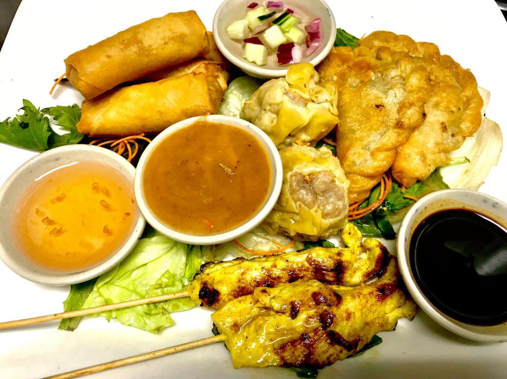 Appetizers Platter · Combination of 2 steamed dumpling, 2 spring rolls, 2 curry puffs, 2 chicken satay and 2 Thai fried shrimp.