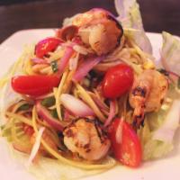Shrimp Mango Salad · Shrimp, shredded mangoes, cashew nuts, red onions and tomatoes in chili lime dressing. Hot a...