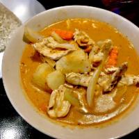 Massaman Curry · Coconut milk, potatoes, onions, peanuts and carrots. Hot and spicy.