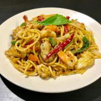 Seafood Spaghetti Kee Mao · Spaghetti pasta and mixed seafood with onions, bell pepper, basil, string beans and eggs in ...