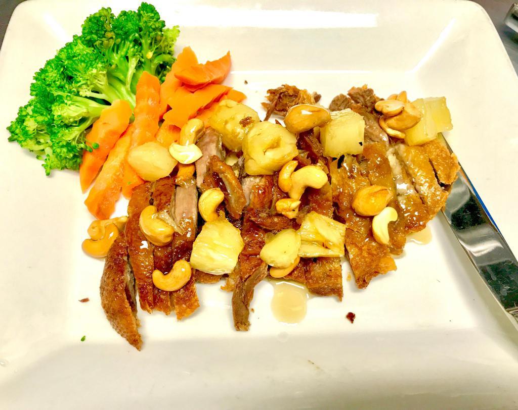 Honey Duck · Crispy duck topped with cashew nuts and pineapple in signature honey sauce.