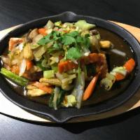 Ginger Sauce · Ginger, scallions, mushrooms, onions, carrots, celery, bell pepper and baby corn in light br...