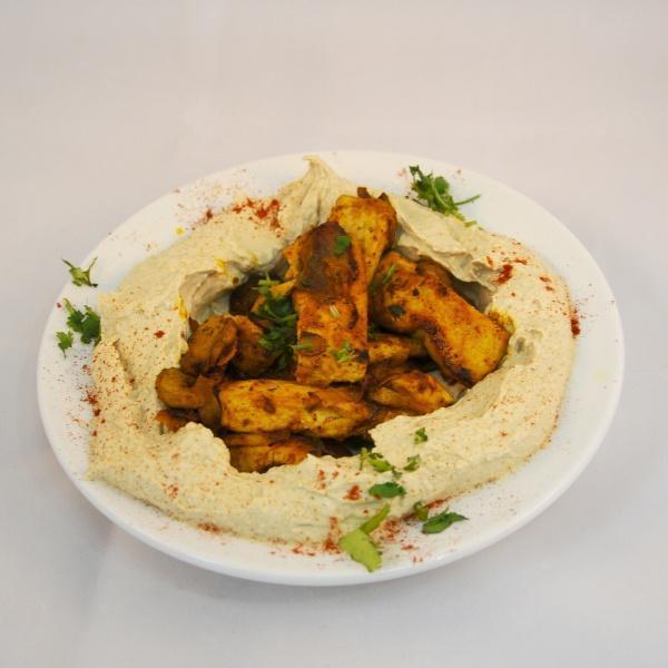 Hummus Ahi Tuna Shawarma · Hummus plate topped with ahi tuna shawarma, saute mushrooms and onions. Served with pita bread.