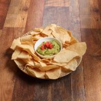 Guacamole Dip · Made with fresh tomatoes, onions, cilantro, jalapenos, garlic and avocados.