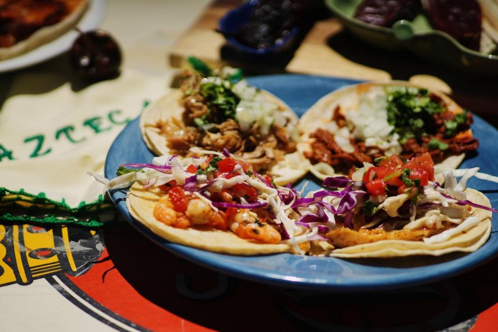 Street Tacos · Organic corn tortillas, choice of meat, topped with cilantro and onions.
