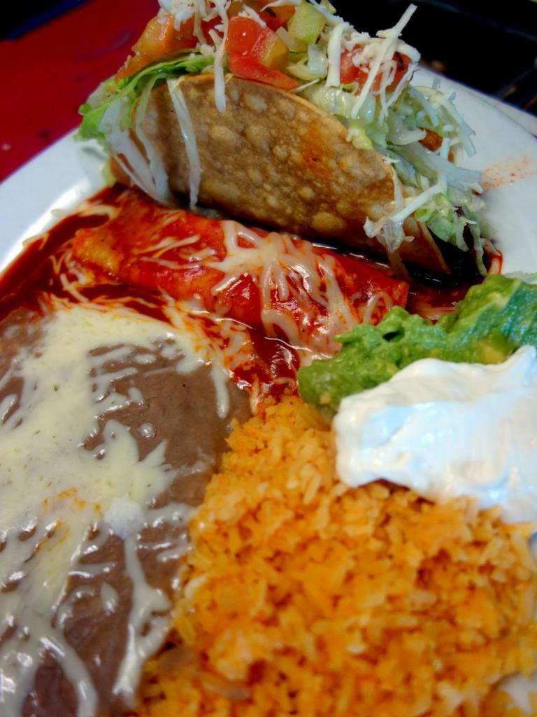Combo 2 Soft Tacos · Choice of meat, choice of beans, tomato rice, guacamole and sour cream.