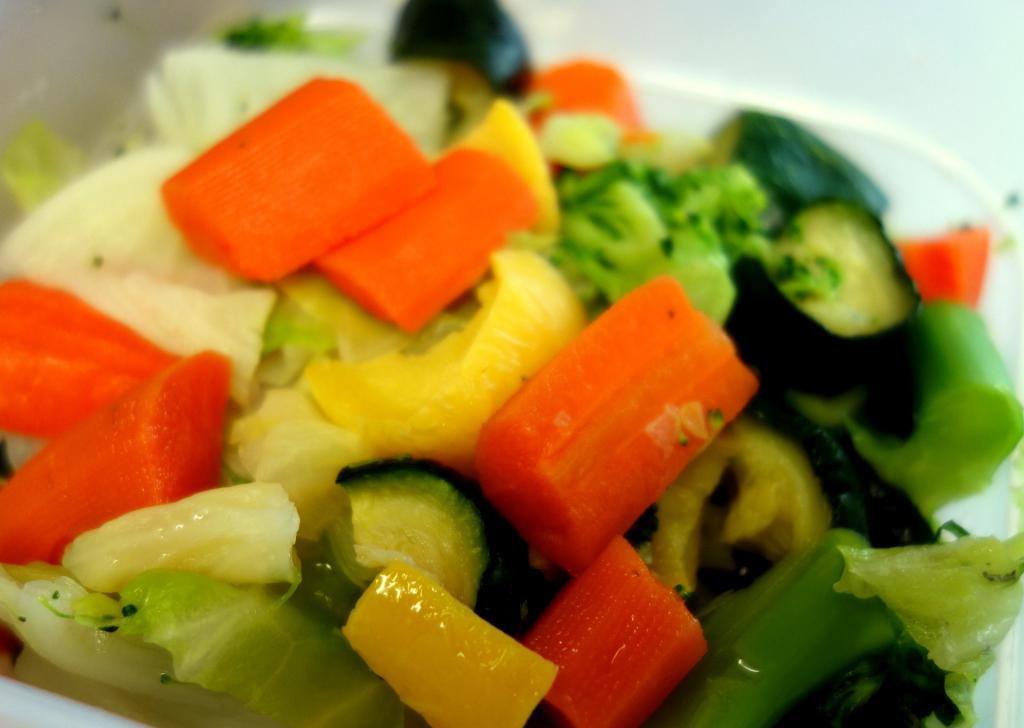 Steamed Vegetables Super Burrito · Broccoli, cabbage, carrots, zucchinis tomato rice, salsa fresca, cheese and guacamole.