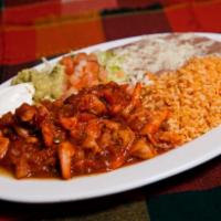 Camarones a la Diabla · Shrimp in spicy red sauce. Served with Mexican tomato rice, beans, sour cream, lettuce, guac...