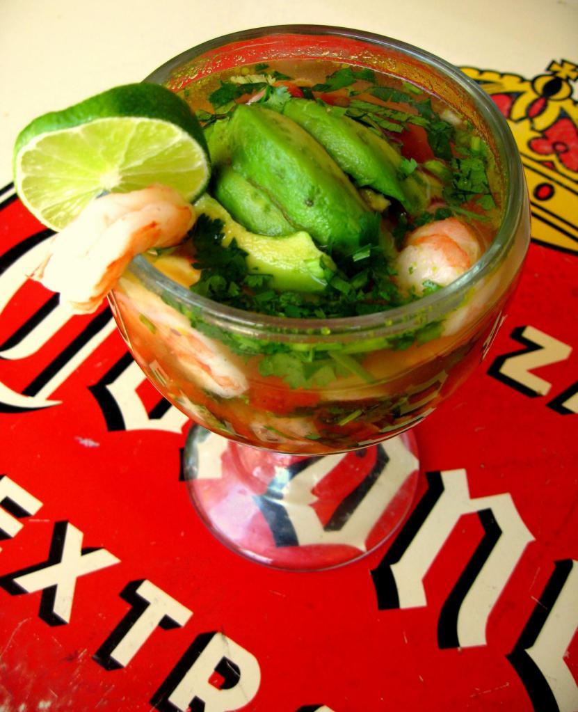 Shrimp Cocktail · Shrimp with diced avocados, tomatoes and onions.