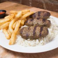 Beef Flat-Top Platter · Seasoned ground beef patties served with your choice of side, rice, sauce, and extras