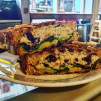 #4 Cranberry Chicken Salad Panini · Chicken salad mixed with cranberries and almonds, spinach, tomato, Swiss cheese, avocado on ...