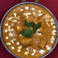 70. Paneer Tikka Masala · Homemade cottage cheese cubes, bell pepper, onion and tomatoes cooked in kadai with chef's s...