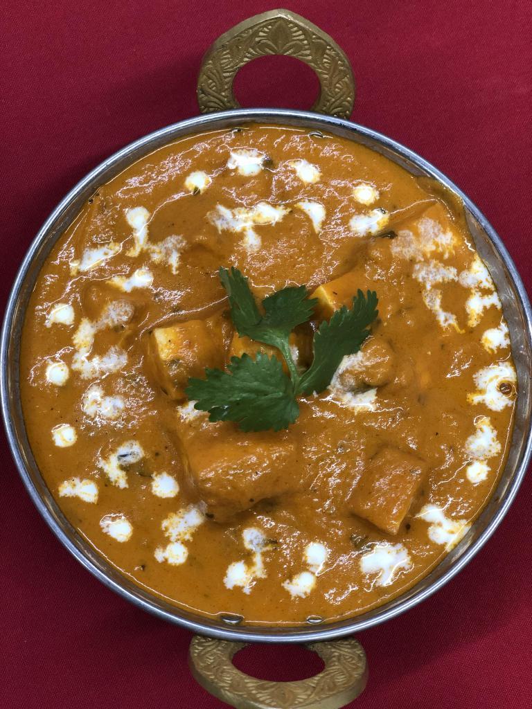 70. Paneer Tikka Masala · Homemade cottage cheese cubes, bell pepper, onion and tomatoes cooked in kadai with chef's special sauce.