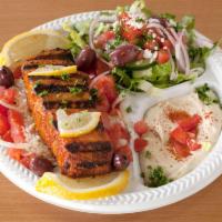 Grilled Salmon Plate · Served with hummus, jasmine rice, house salad and pita.