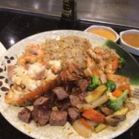 Kobe Delight · Ribeye steak, shrimp and ocean scallop in a house special teriyaki sauce. All beef is Angus ...