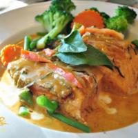 Panang Salmon · Grilled salmon fillet topped with sweet creamy panang curry sauce with green bean, carrot an...