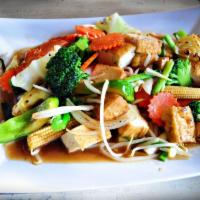Veggies Delight (Pad Ruam Mit) · Choice of meat or tofu stir-fried in house sauce with broccoli, carrot, cabbage, onions, bel...