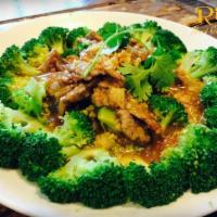 Broccoli Delight · Choice of meat or tofu stir-fried in house special sauce served on top of steamed broccoli. 