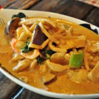 Red Curry · Choice of meat or tofu with eggplant, bamboo shoot, bell and basil in red curry sauce. Spicy.