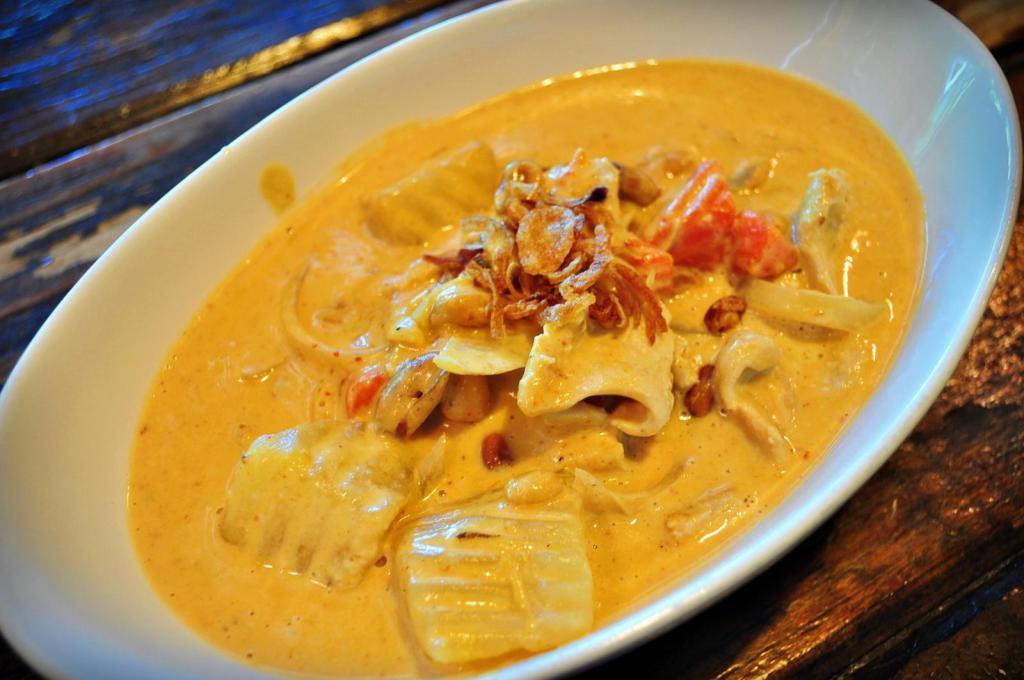 Massaman Curry · Choice of meat or tofu with potato, onion, carrot, peanut in massaman curry sauce. Spicy.