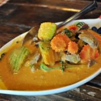 Pumpkin Curry · Choice of meat or tofu with pumpkin, carrot, bell and basil in red curry sauce. Spicy.