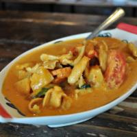 Pineapple Curry · Choice of meat or tofu with pineapple, carrot, tomato, bell and basil in red curry sauce. Sp...